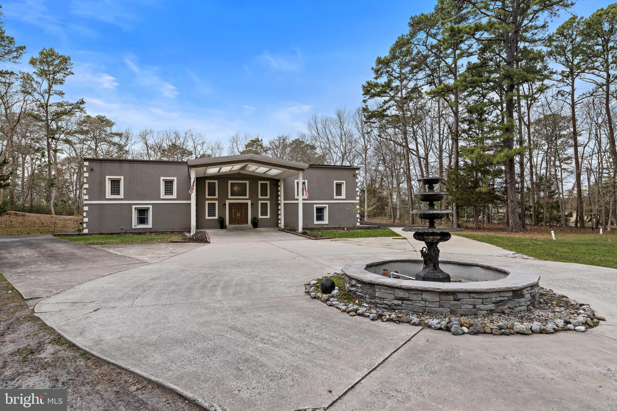 77 West Greenbush Road Tuckerton, NJ 08087 - Photo 74 of 75 a house view with a sitting space and garden