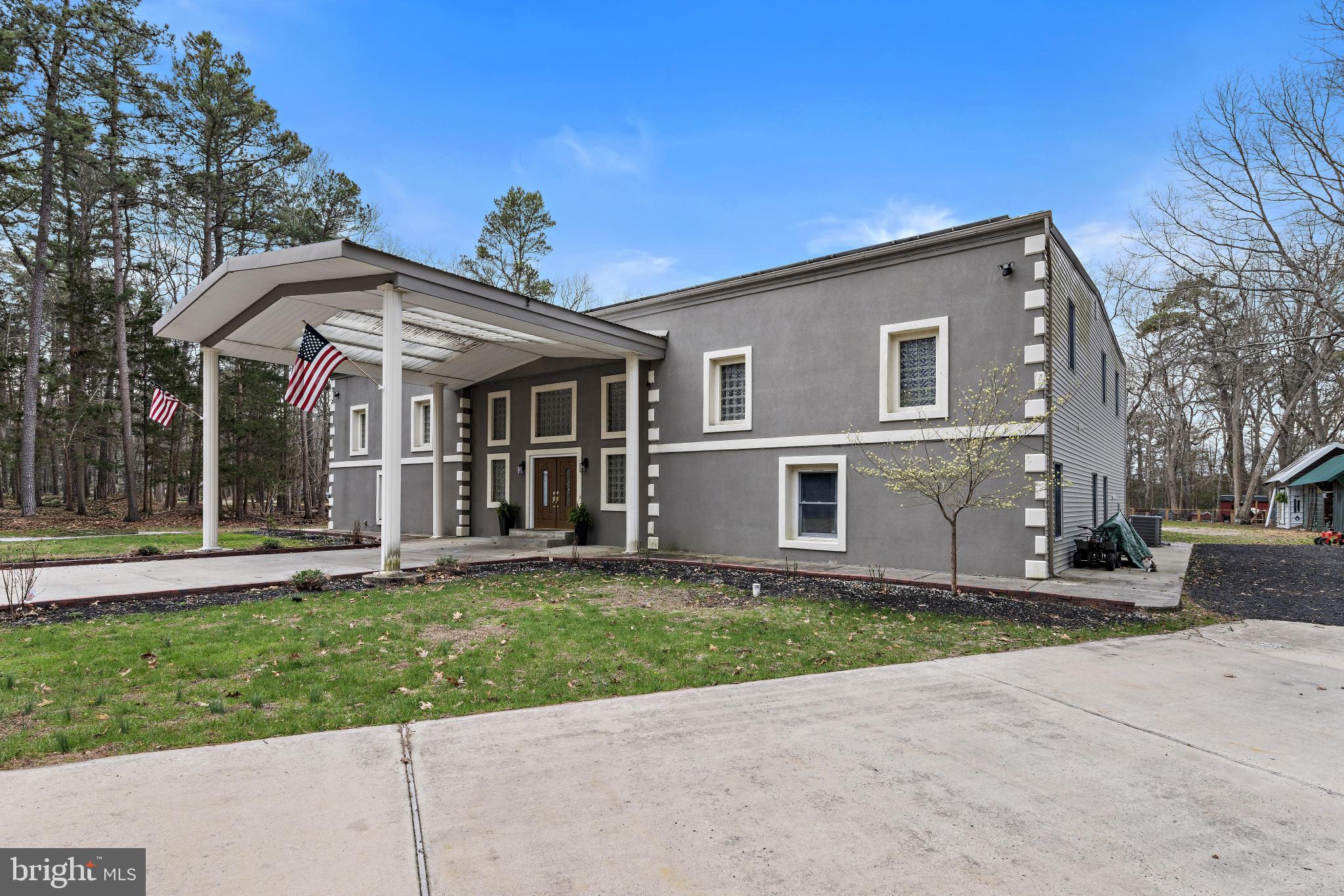 77 West Greenbush Road Tuckerton, NJ 08087 - Photo 75 of 75 a view of a house with a yard and plants
