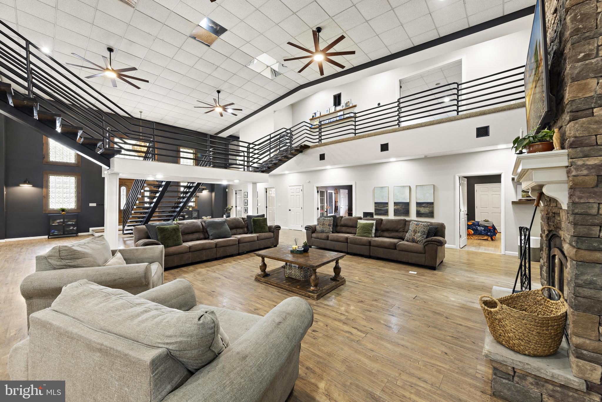 77 West Greenbush Road Tuckerton, NJ 08087 - Photo 10 of 75 a living room with furniture and a chandelier