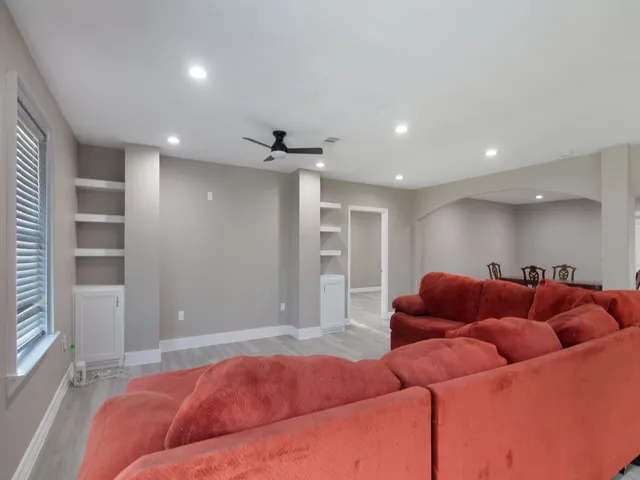 a living room with furniture and a couch