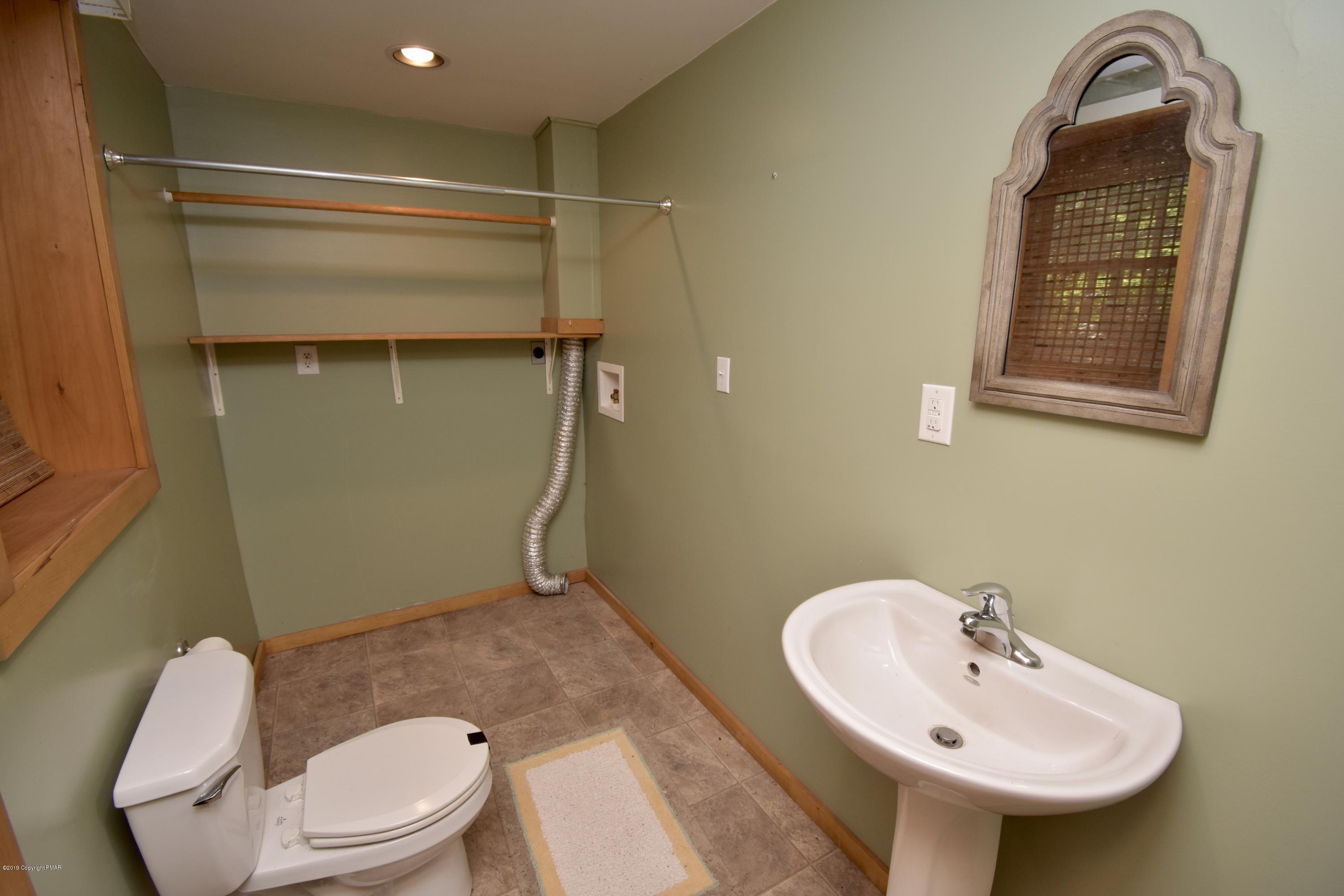 177 Saw Mill Road Pocono Lake, PA 18347 - Photo 32 of 41 powder room and laundry