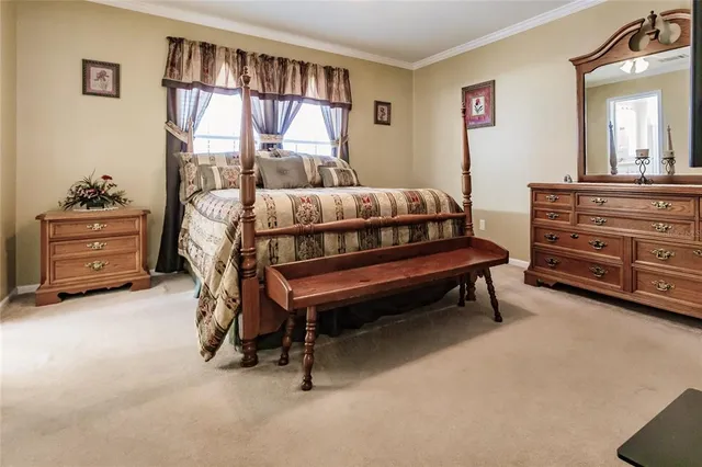 a bedroom with a bed and a closet