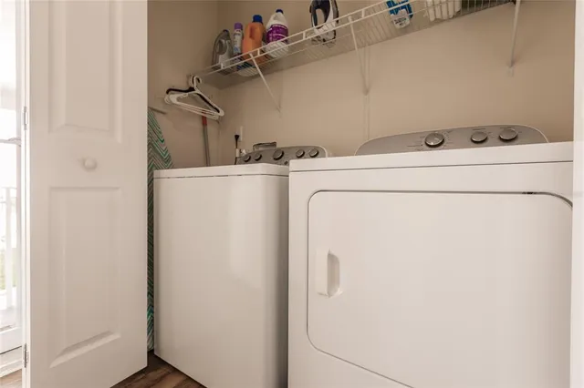 a utility room with dryer and washer