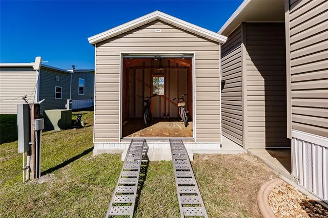 a front view of house with outdoor seating