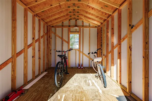 a view of an entryway with wooden floor and stairs