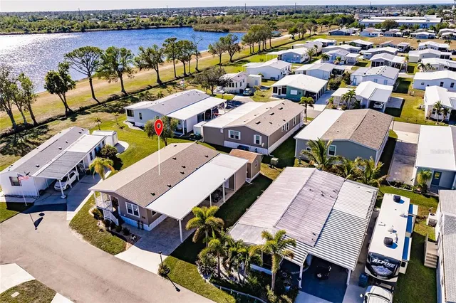 an aerial view of a houses with outdoor space
