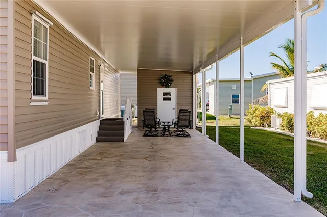 a view of a porch with garden