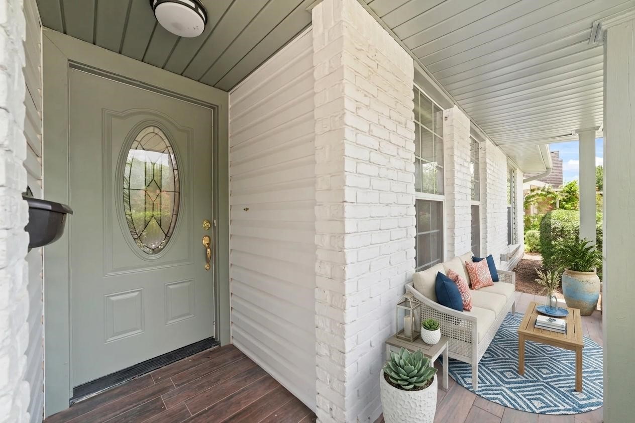 5922 Hummingbird Street Houston, TX 77096 - Photo 3 of 26 The covered front porch is equal parts charm and function, creating the perfect place to ease into your morning or unwind after a busy day. Just add coffee, a couple of rocking chairs, and your favorite people. (VS)