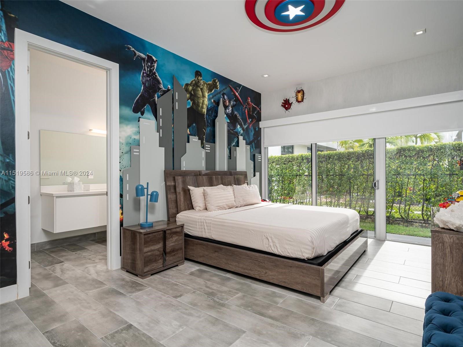 16601 Sunset Way Weston, FL 33326 - Photo 32 of 53 a bed sitting in a room next to a window