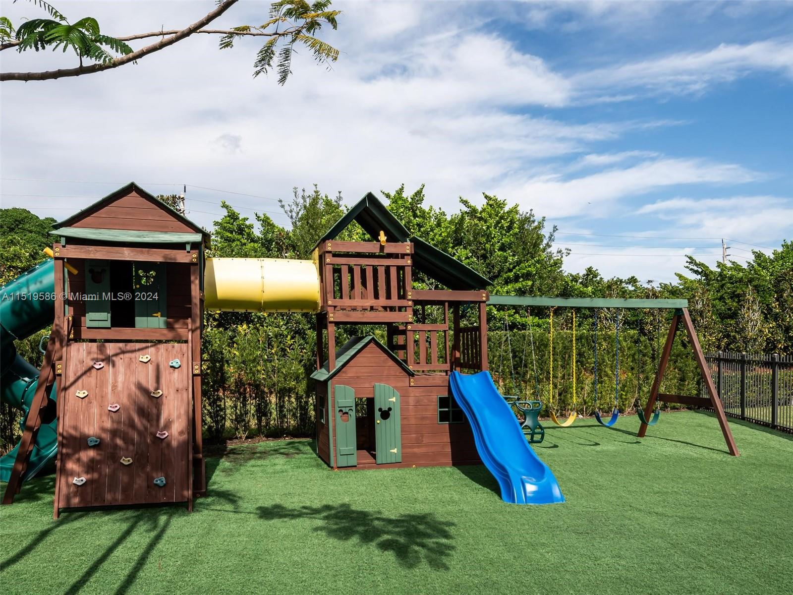 16601 Sunset Way Weston, FL 33326 - Photo 44 of 53 a front view of a house with garden