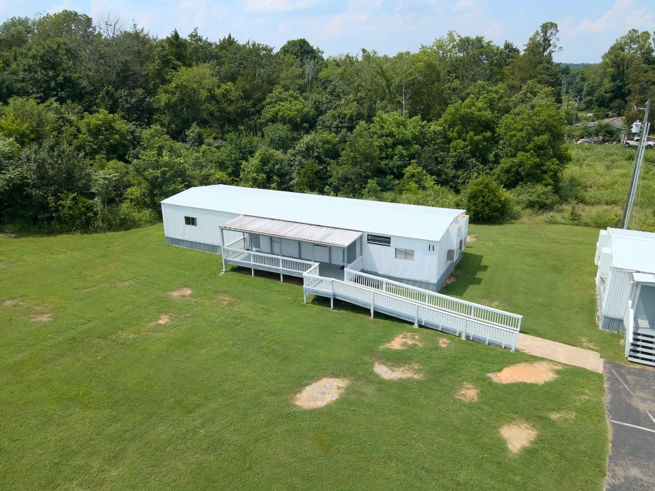 5742 Seminary Road Smyrna, TN 37167 - Photo 13 of 32 a view of a house with a backyard
