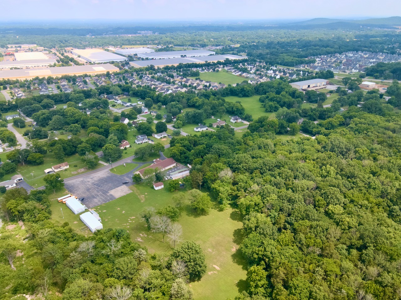 5742 Seminary Road Smyrna, TN 37167 - Photo 19 of 32 an aerial view of residential houses with outdoor space and trees