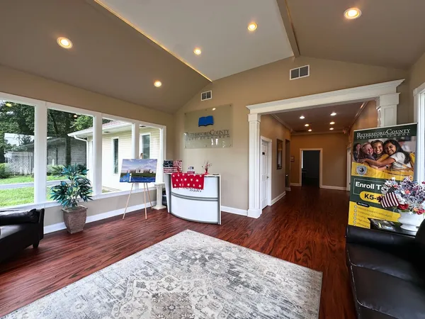 a bed room with furniture and a rug