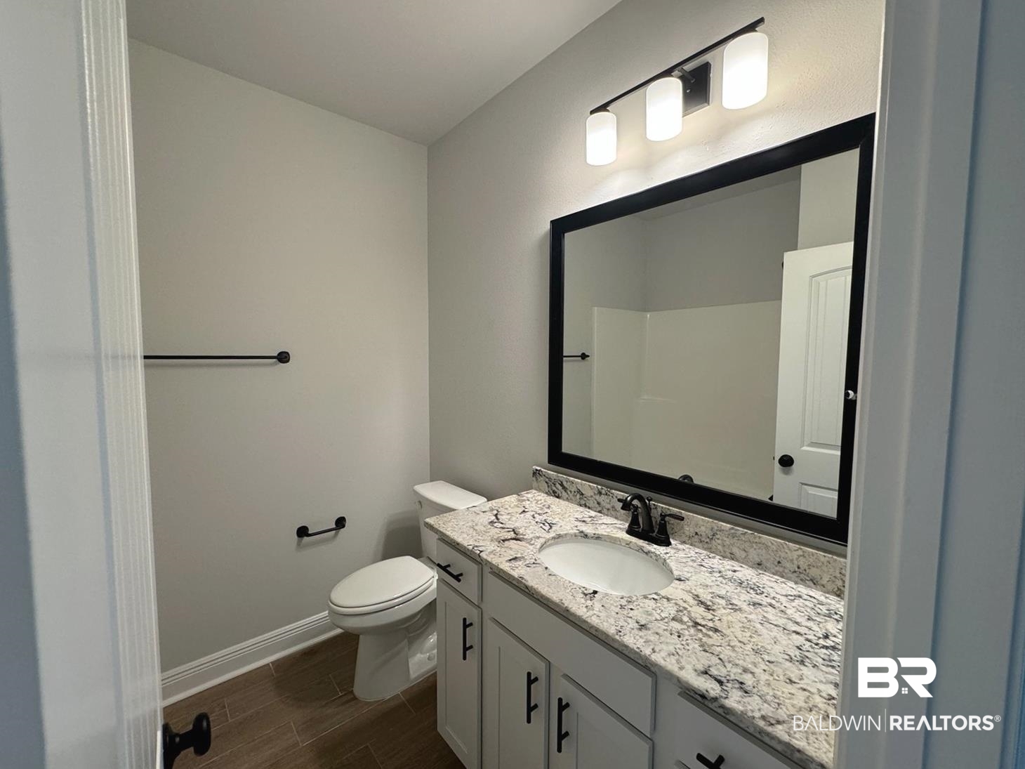 860 Sumter Loop Foley, AL 36535 - Photo 20 of 26 Bathroom with vanity and toilet