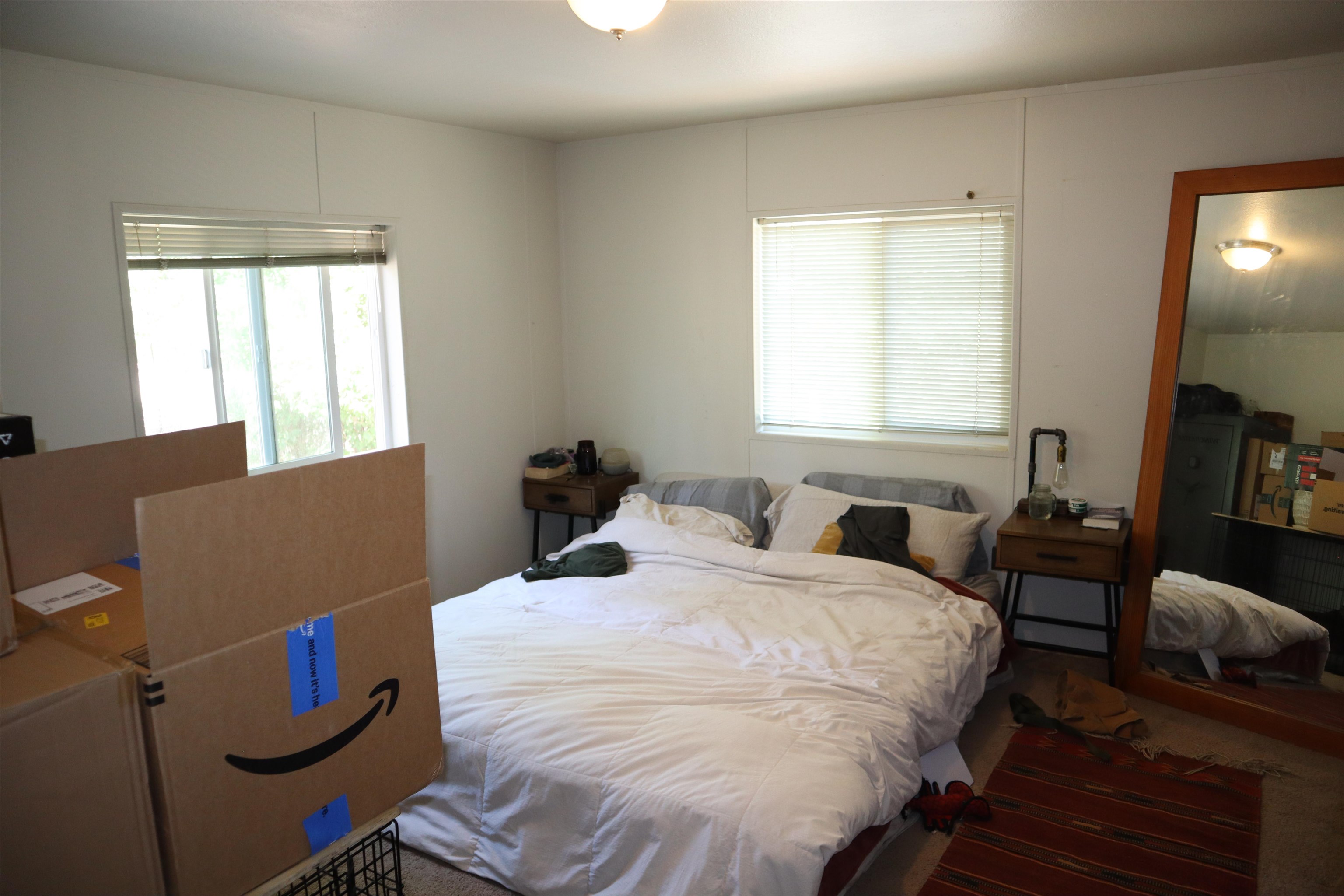 193 Fairground Road Quincy, CA 95971 - Photo 9 of 20 a bed room with two bed and a couch