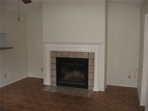 a living room with a fireplace