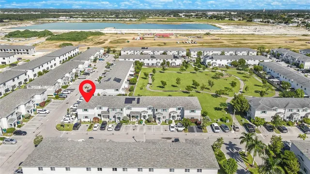 an aerial view of a city and lake view