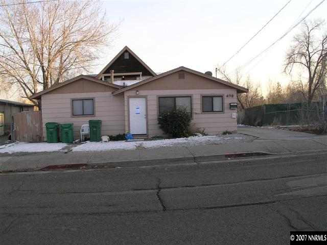 470 Highland Avenue Reno, NV 89512 - Photo 1 of 7 a front view of a house with a yard and garage
