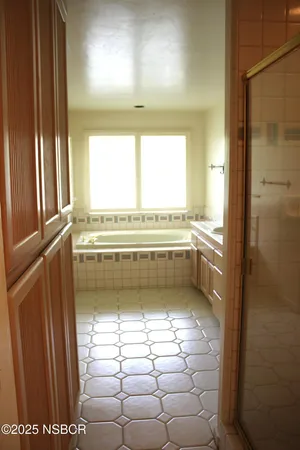a view of a bathroom with a window