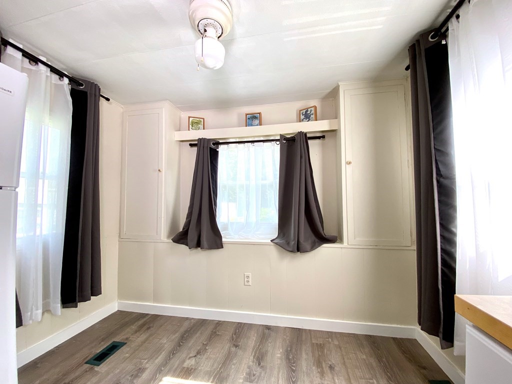 42 Adams Road, Unit 25 Greenfield, MA 01301 - Photo 15 of 37 a view of walk in closet with clothes and shoes
