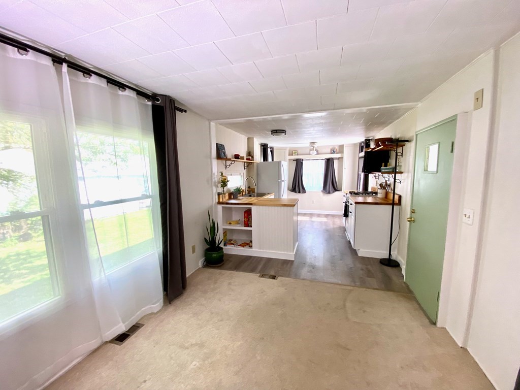 42 Adams Road, Unit 25 Greenfield, MA 01301 - Photo 22 of 37 a view of a kitchen with refrigerator and a sink