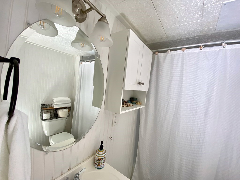 42 Adams Road, Unit 25 Greenfield, MA 01301 - Photo 27 of 37 a bathroom with a sink toilet and shower