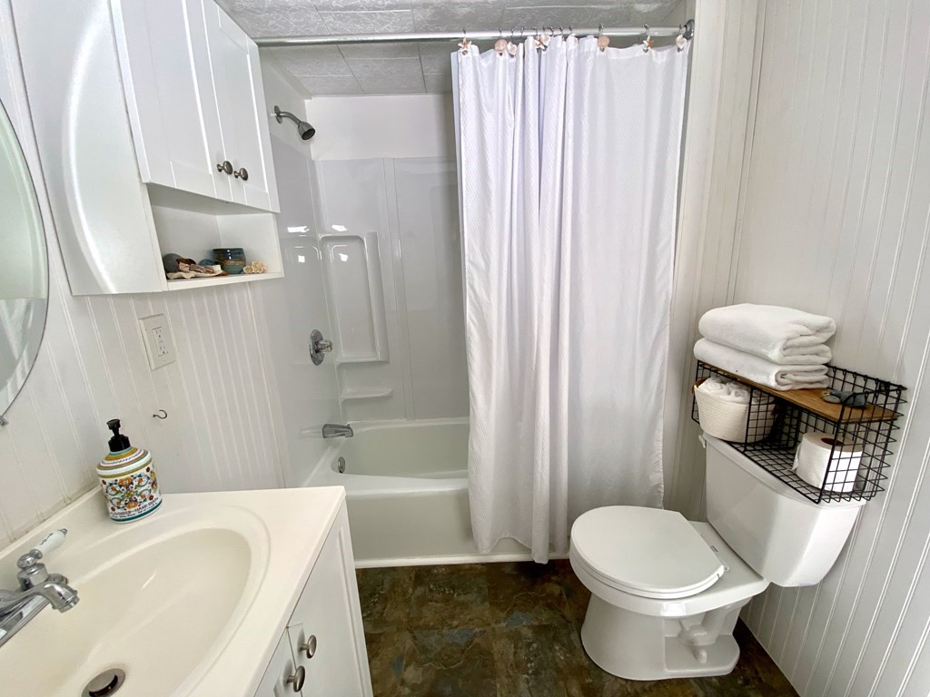 42 Adams Road, Unit 25 Greenfield, MA 01301 - Photo 28 of 37 a bathroom with a sink toilet and shower