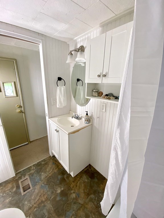 42 Adams Road, Unit 25 Greenfield, MA 01301 - Photo 29 of 37 a utility room with cabinets washer and dryer
