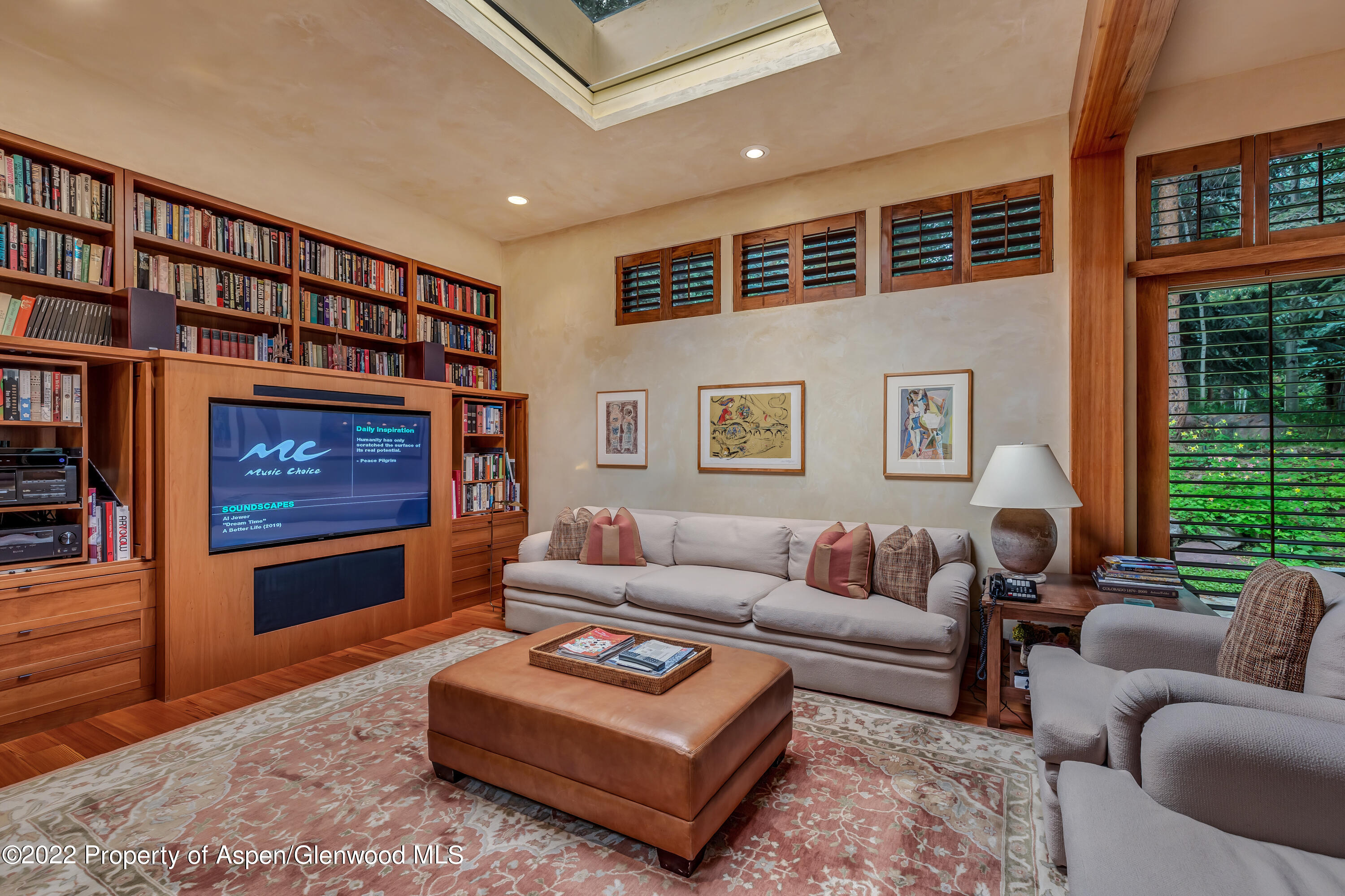 332 Glen Eagle Drive Aspen, CO 81611 - Photo 13 of 37 a living room with furniture and a flat screen tv