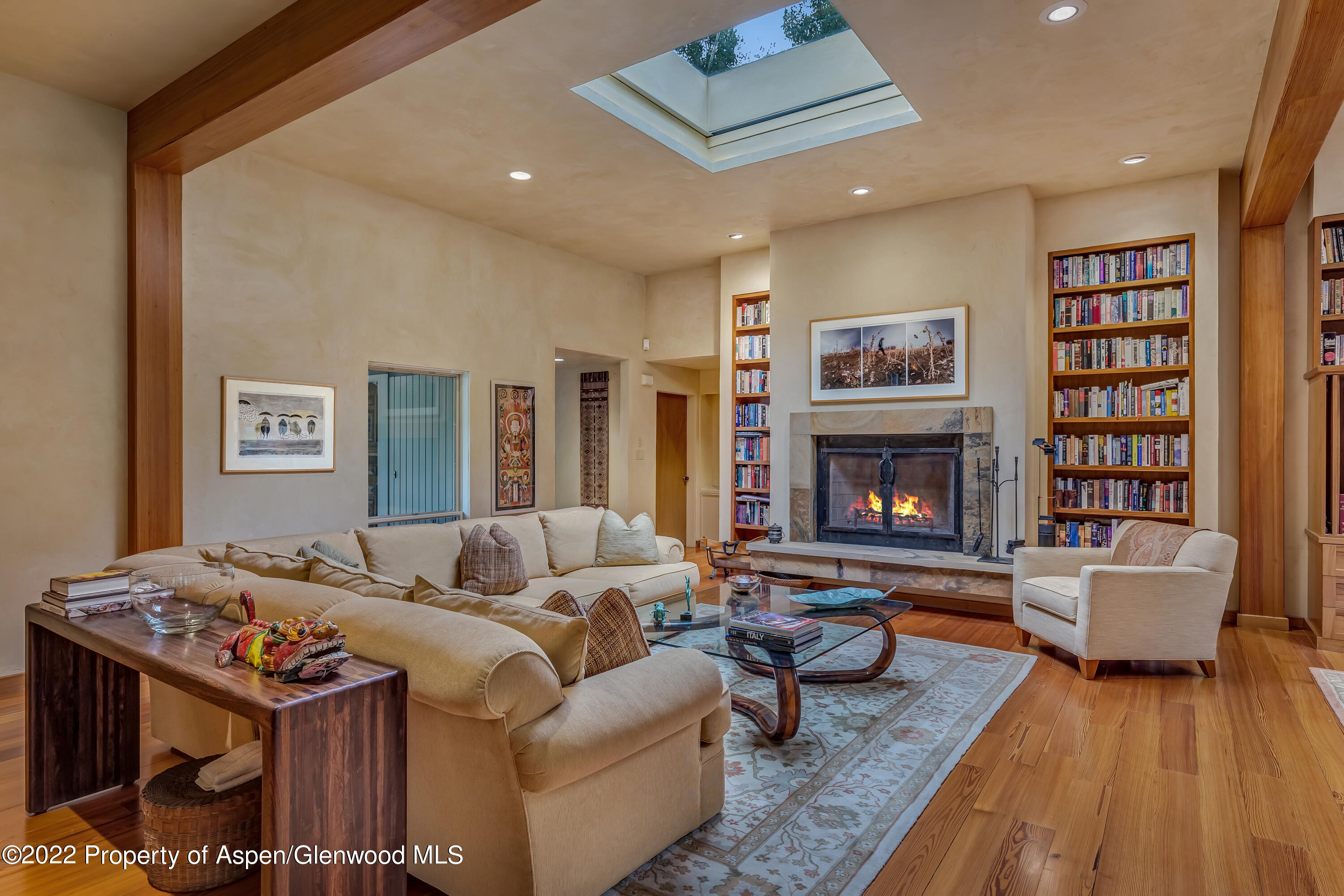 332 Glen Eagle Drive Aspen, CO 81611 - Photo 14 of 37 a living room with furniture and a fireplace