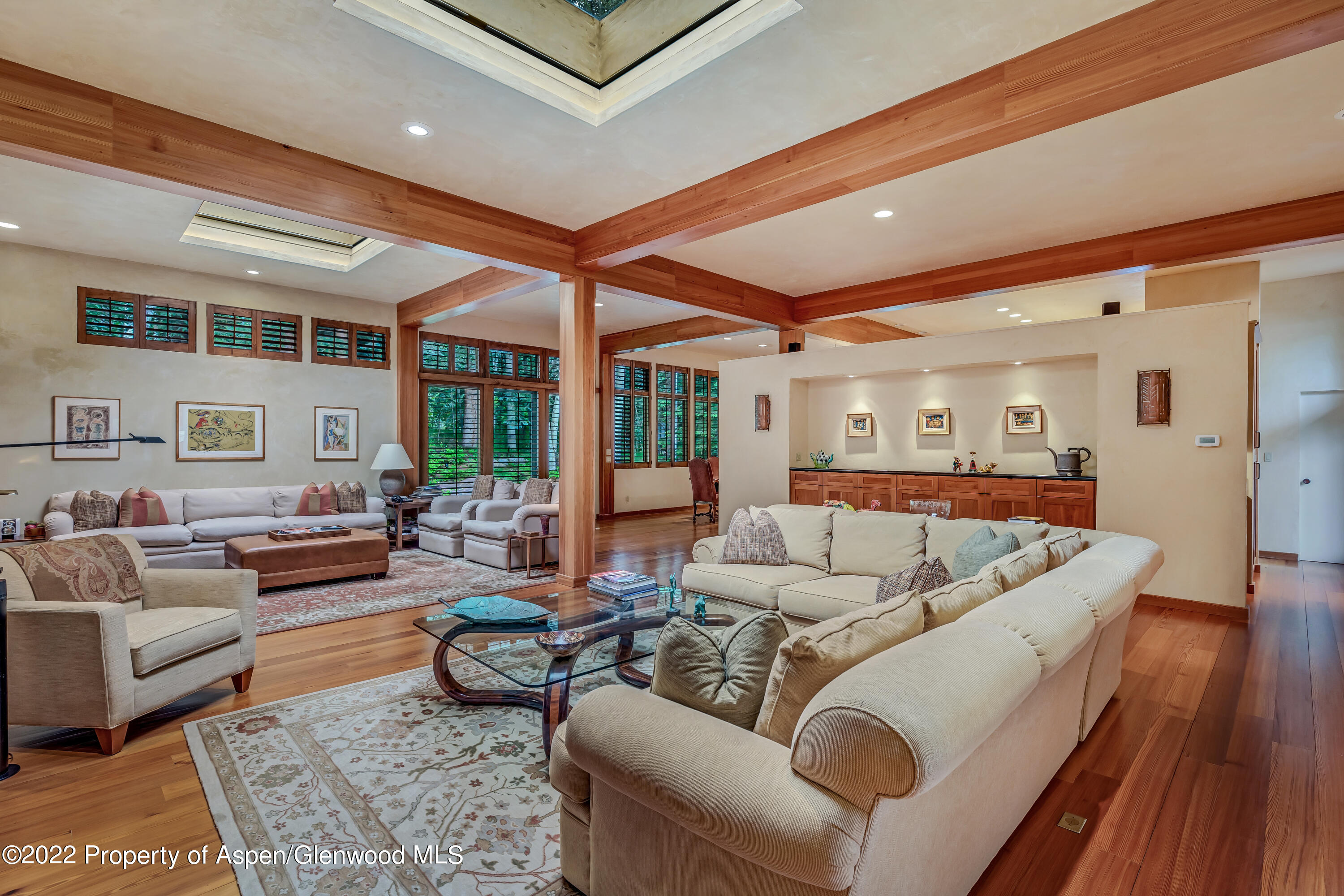 332 Glen Eagle Drive Aspen, CO 81611 - Photo 16 of 37 a living room with furniture wooden floor and white walls