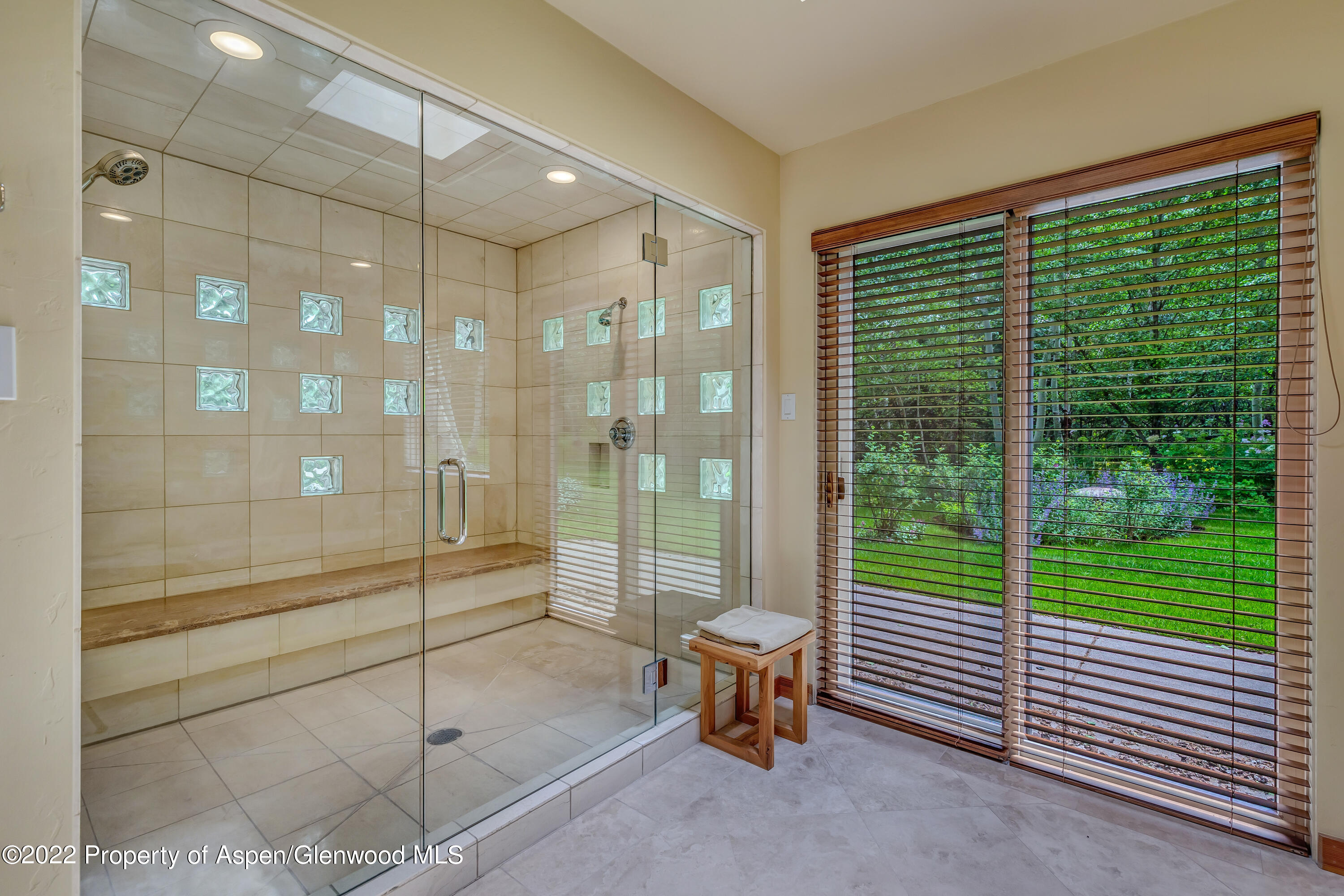 332 Glen Eagle Drive Aspen, CO 81611 - Photo 22 of 37 a bathroom with a shower and a sink