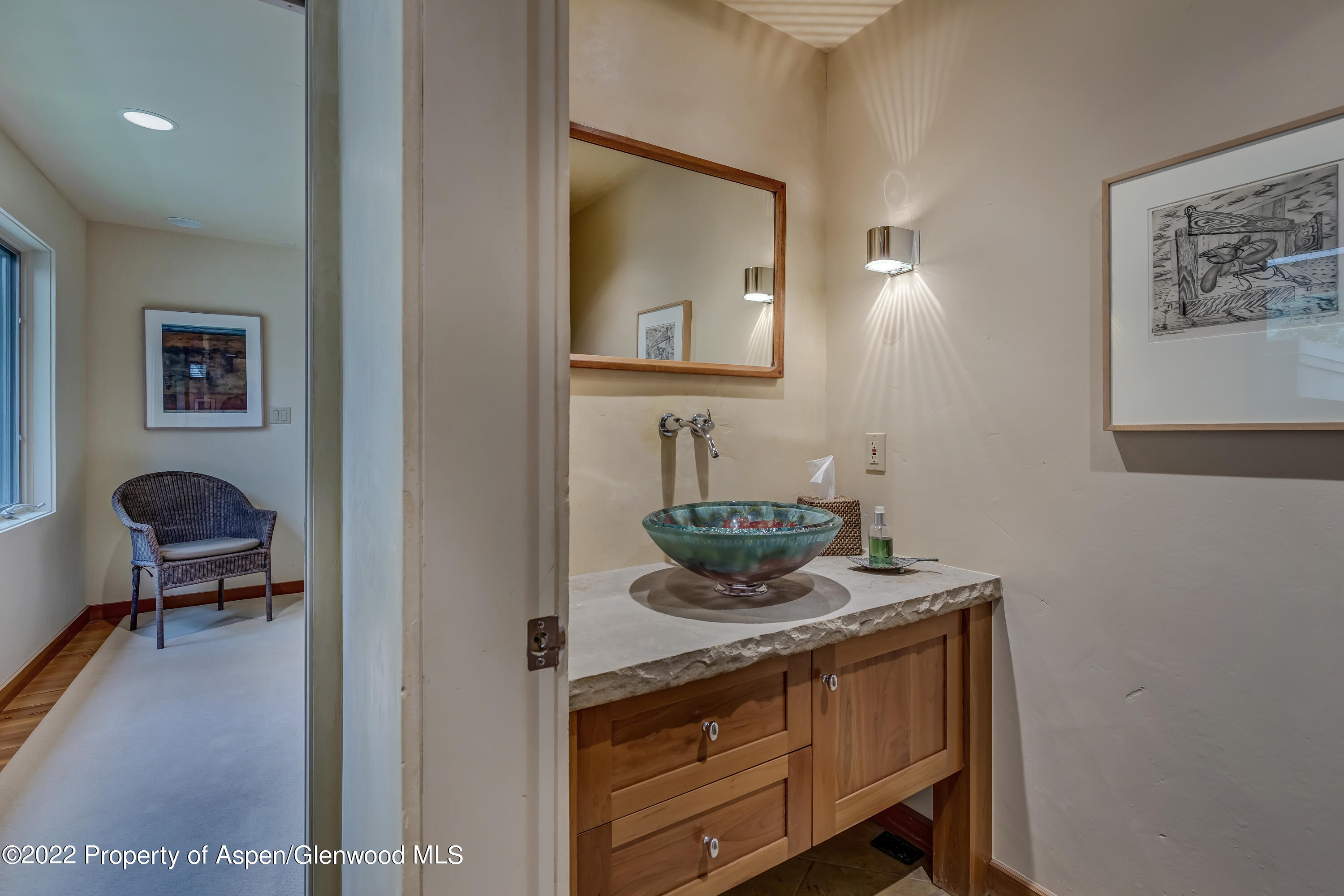 332 Glen Eagle Drive Aspen, CO 81611 - Photo 31 of 37 a hallway with a couch and dresser
