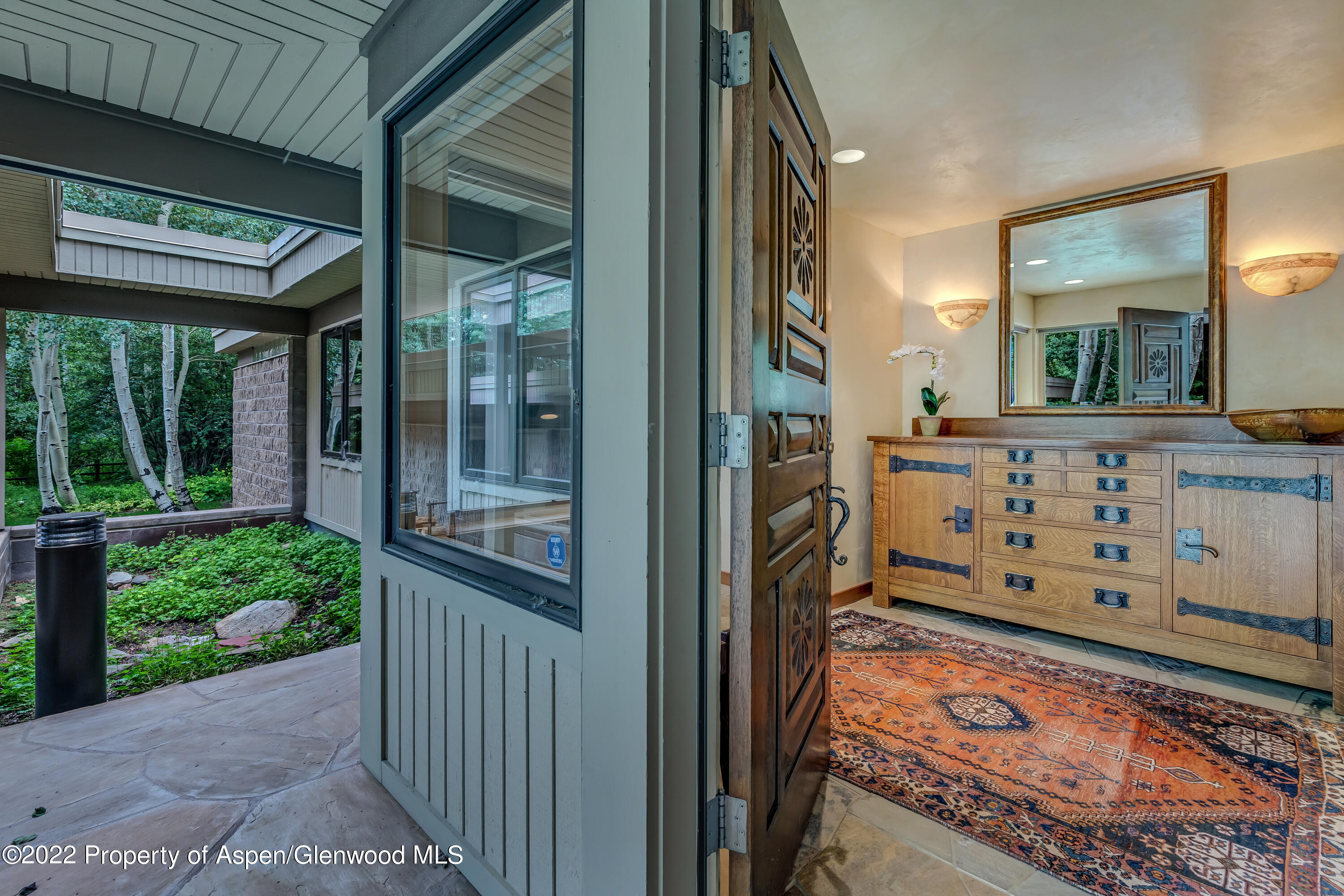 332 Glen Eagle Drive Aspen, CO 81611 - Photo 4 of 37 a view of a entryway door of the house
