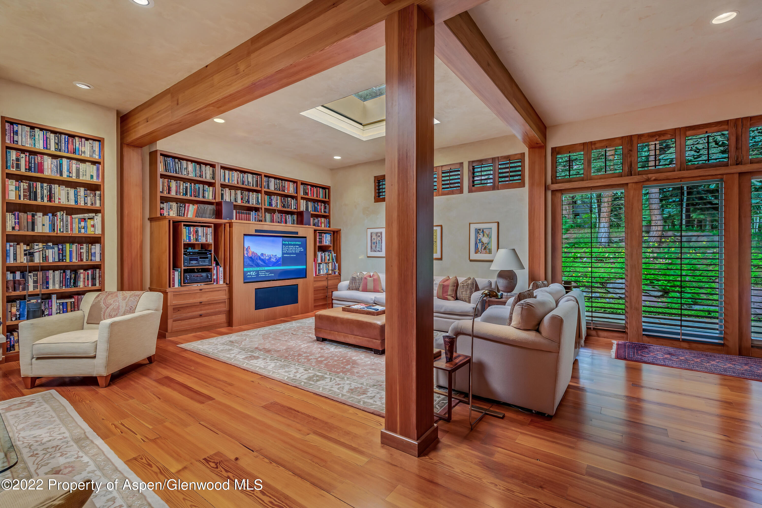332 Glen Eagle Drive Aspen, CO 81611 - Photo 5 of 37 a living room with furniture and a fireplace