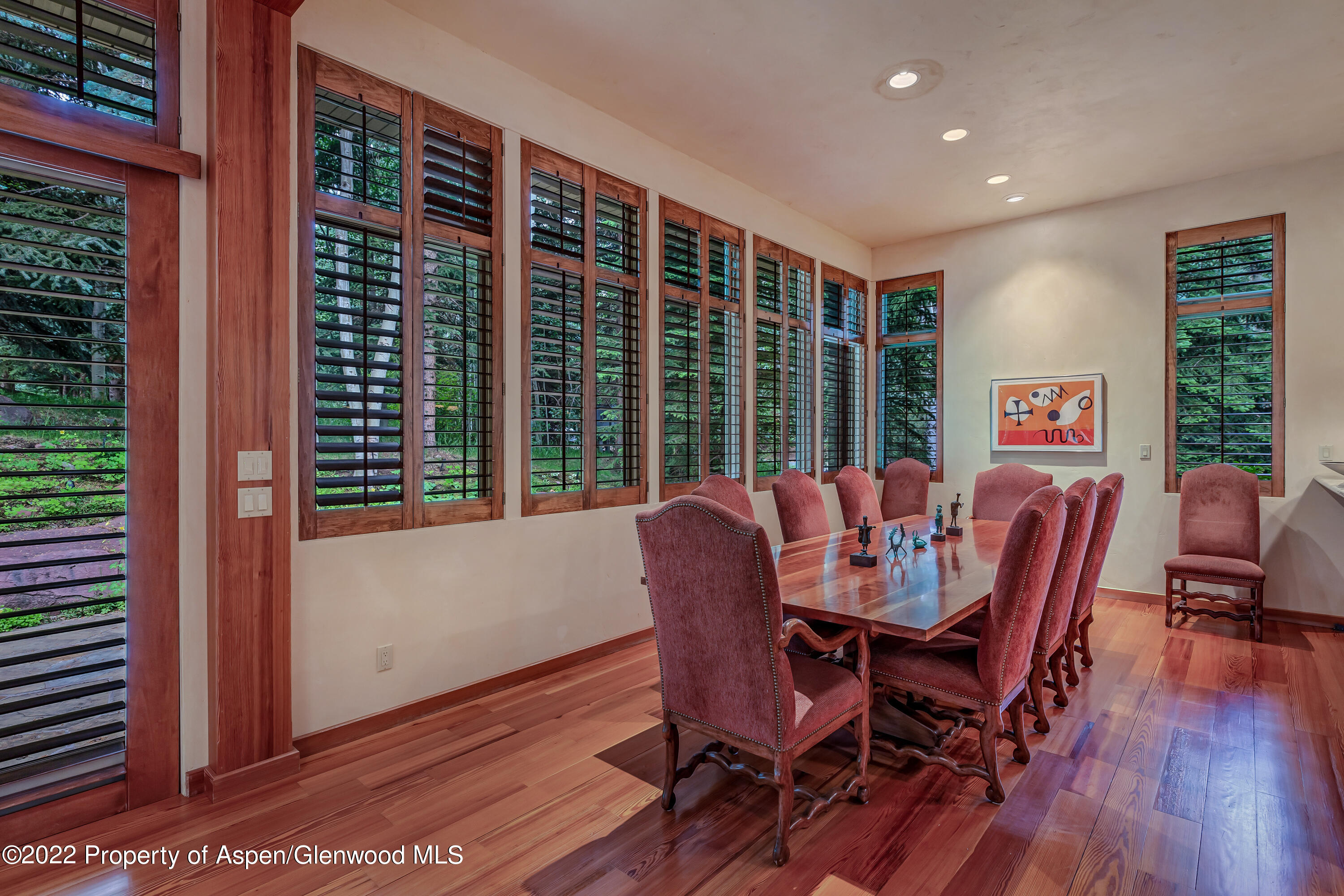332 Glen Eagle Drive Aspen, CO 81611 - Photo 10 of 37 a dining room with furniture window and wooden floor