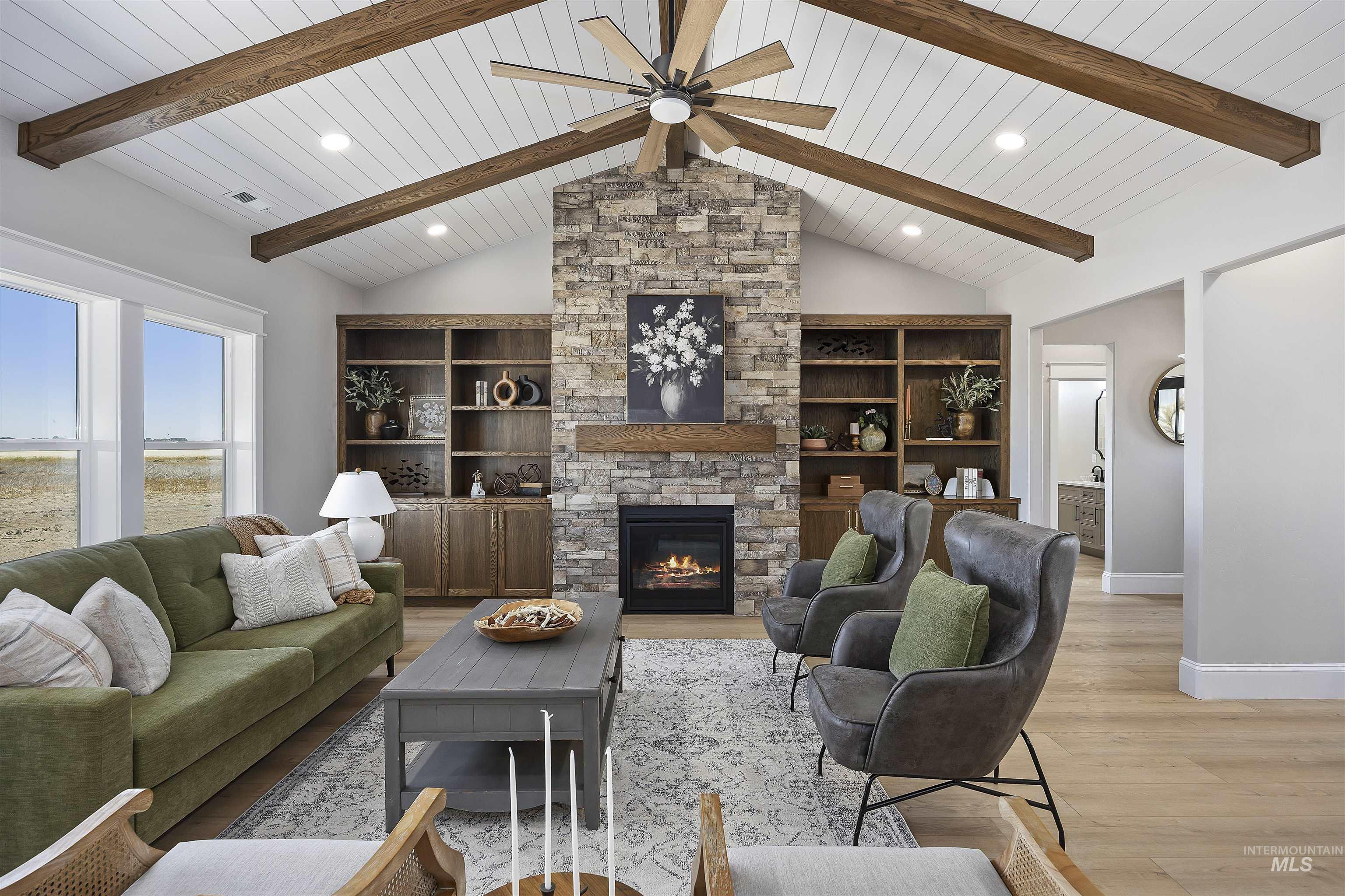 378 West 100 South Rupert, ID 83350 - Photo 10 of 50 Vaulted ceiling with exposed wood beams and white paneling