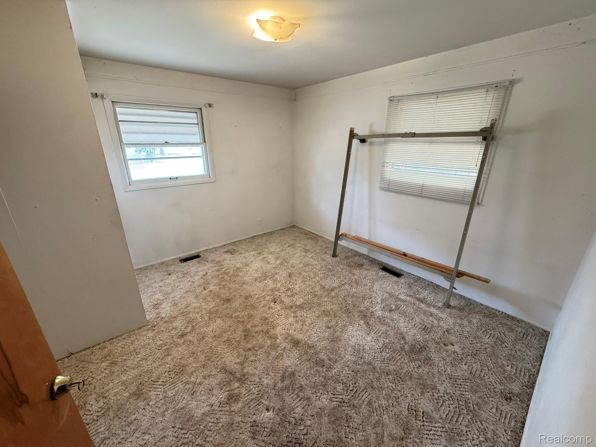 47166 Roland Street Utica, MI 48317 - Photo 14 of 18 Unfurnished bedroom featuring carpet flooring