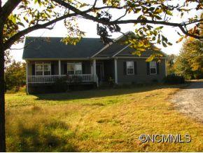 520 Scoggins Rutherfordton, NC 28139 - Photo 1 of 13 a house with a tree in the background