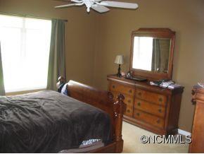 520 Scoggins Rutherfordton, NC 28139 - Photo 8 of 13 a bedroom with a bed and a dresser