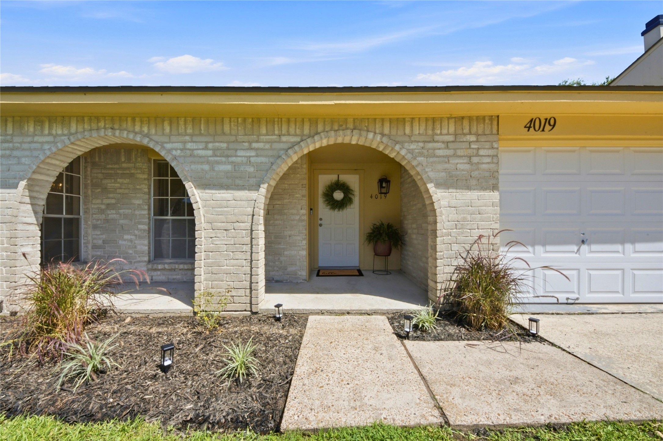 4019 Postwood Drive Spring, TX 77388 - Photo 4 of 50 a front view of a house with garden