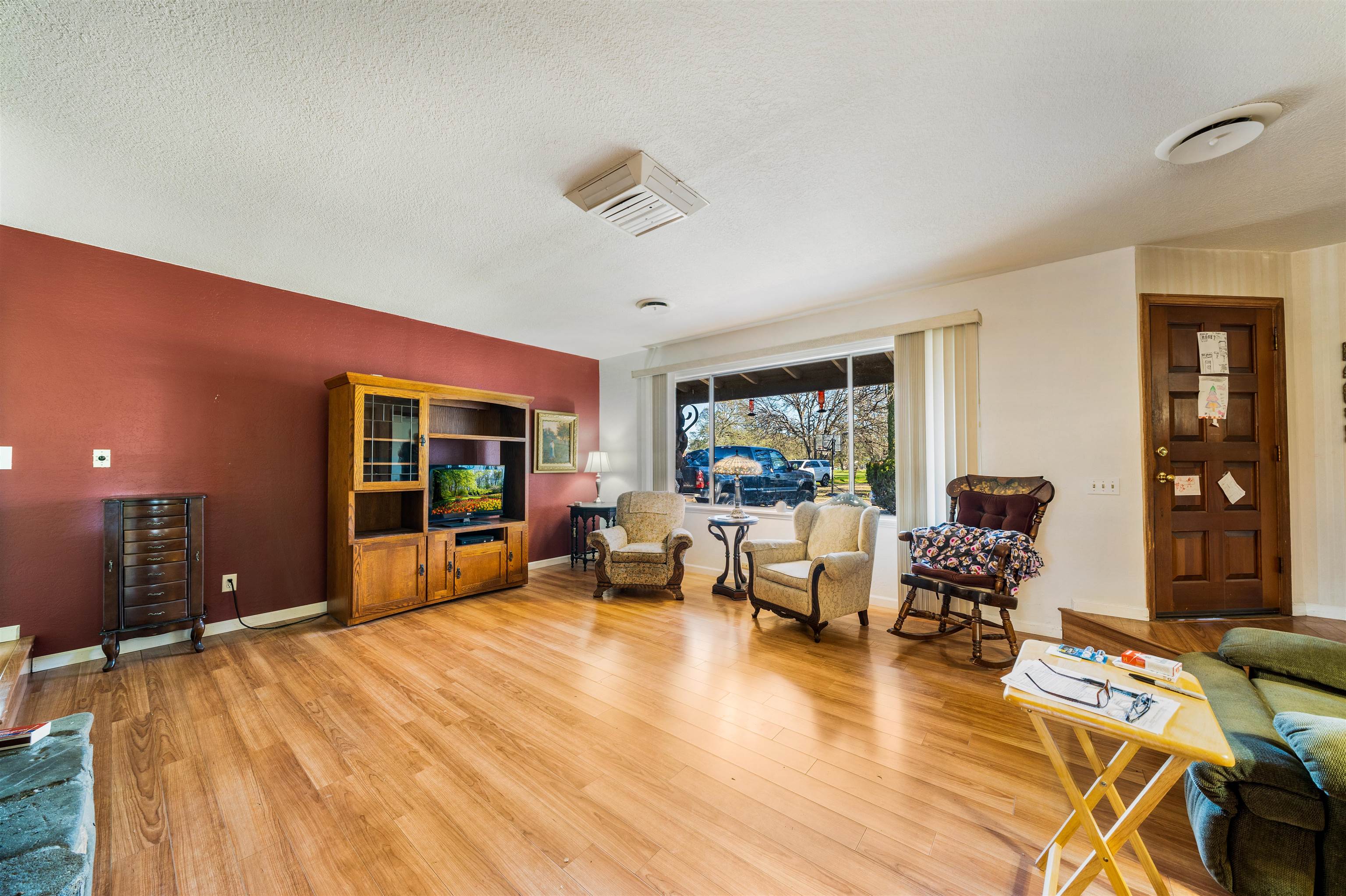 19050 Ridge Road Red Bluff, CA 96080 - Photo 13 of 36 a living room with furniture and a large window