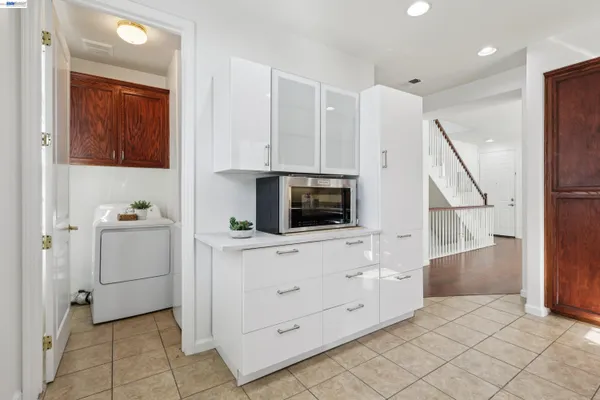 a view of hallway with washer and dryer