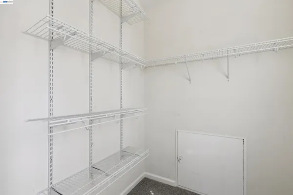 a view of a room with racks on the wall