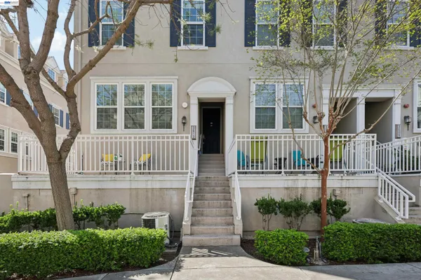 front view of a house with a garden