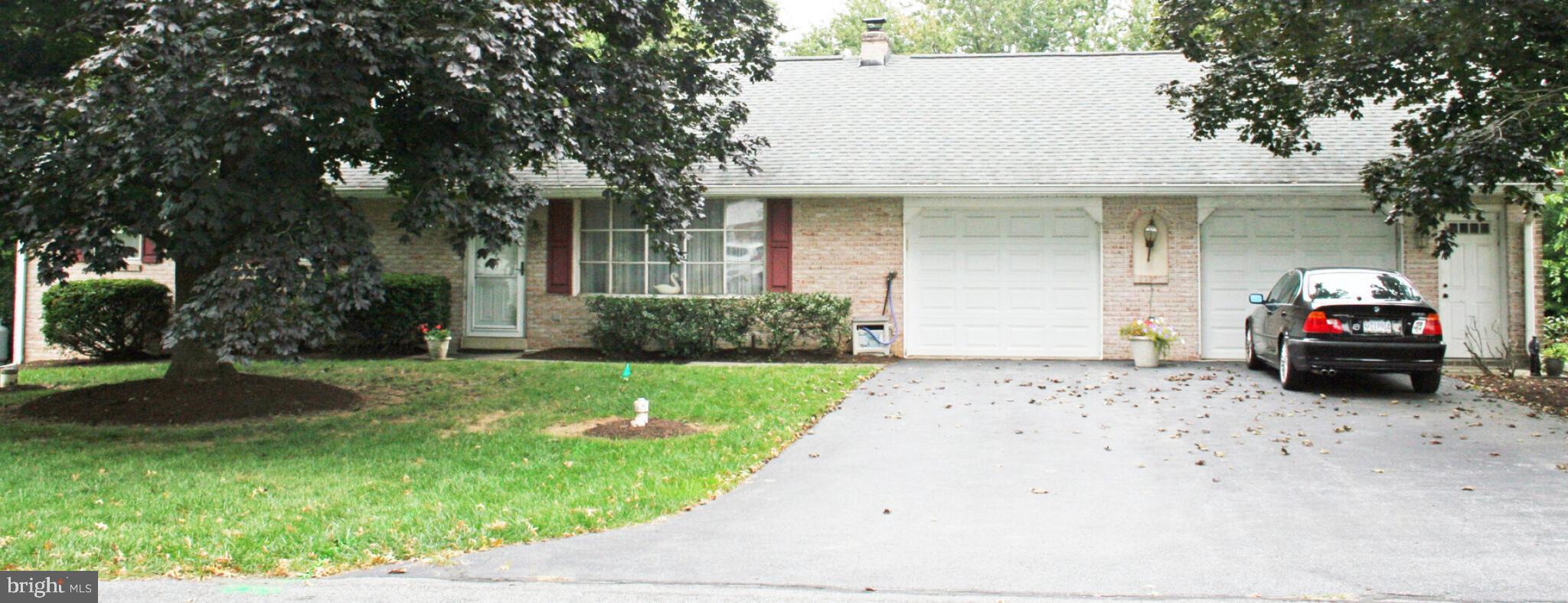 914 May Road Lititz, PA 17543 - Photo 1 of 8 a car parked in front of white house