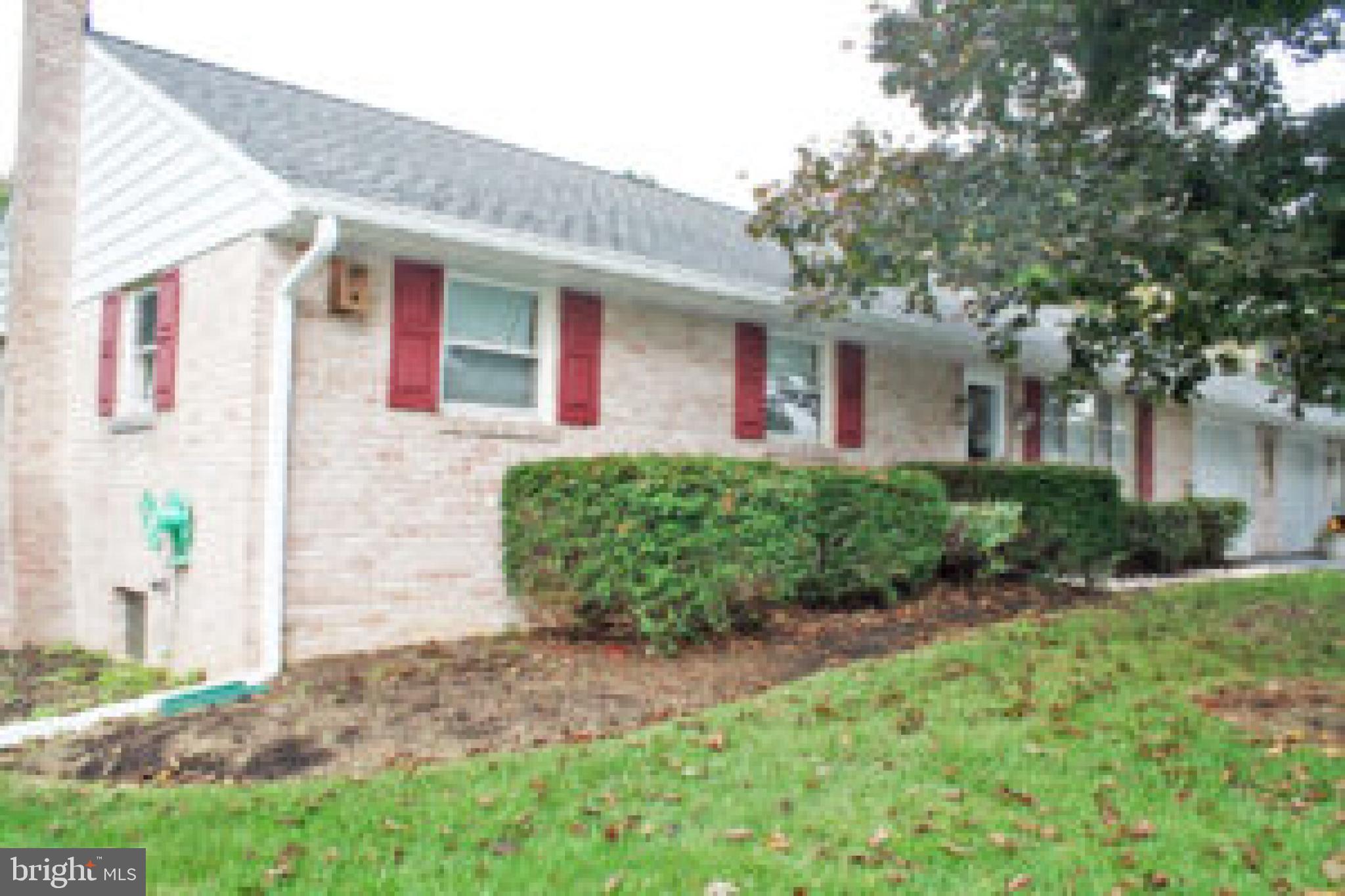 914 May Road Lititz, PA 17543 - Photo 7 of 8 a front view of a house with garden