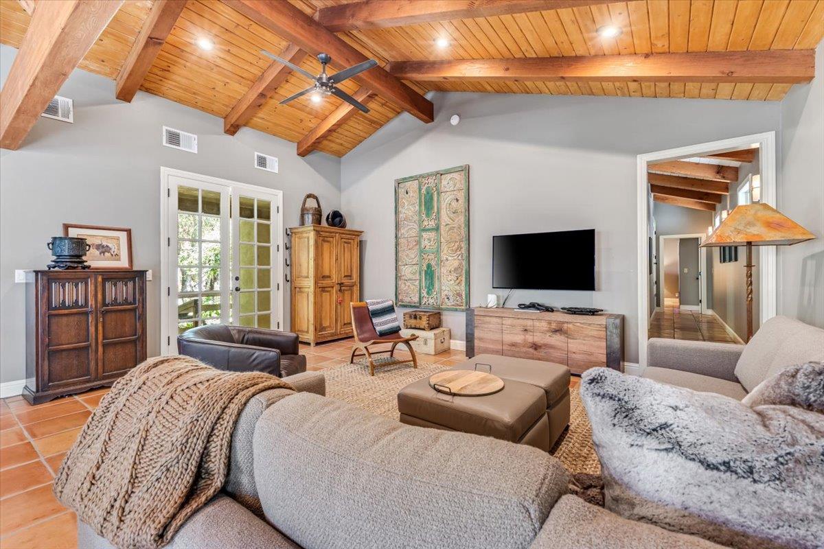2727 Thomas Road Hollister, CA 95023 - Photo 55 of 83 a living room with furniture flat screen tv and a large window
