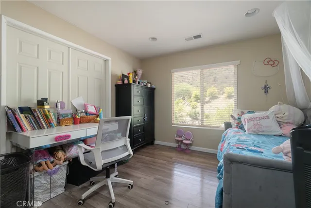 a workspace with furniture and a window