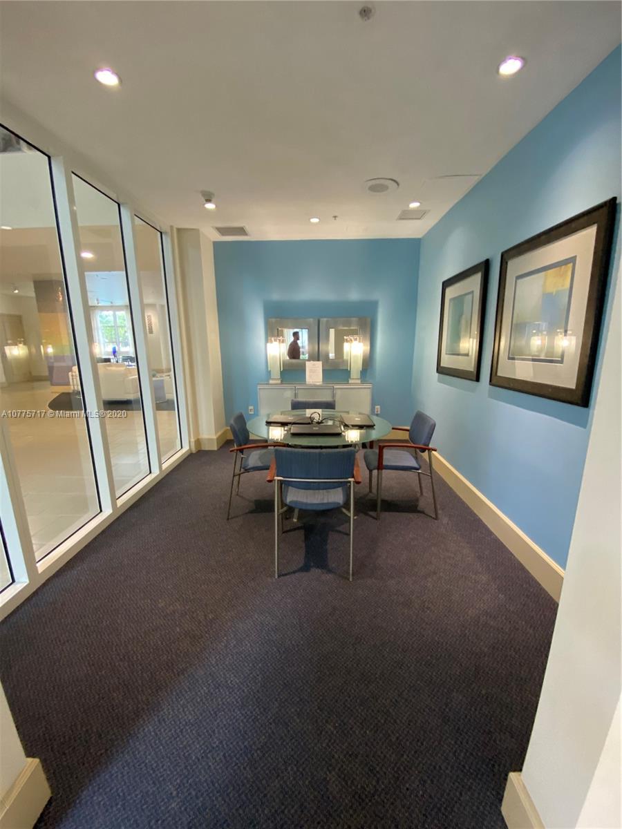 2000 North Bayshore Drive, Unit 407 Miami, FL 33137 - Photo 14 of 19 a living room with furniture and a large window